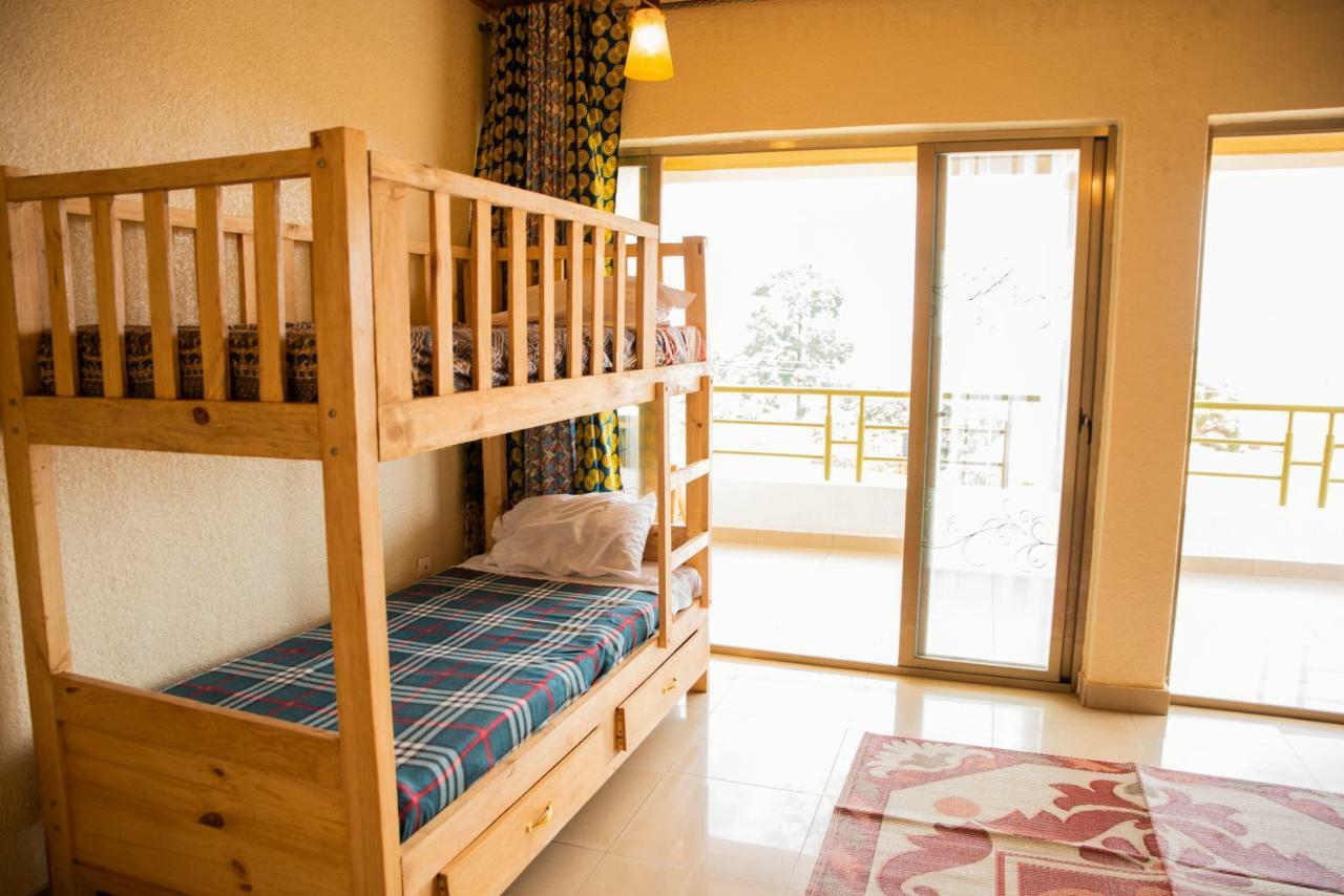 Хостел Kigali Castle Экстерьер фото